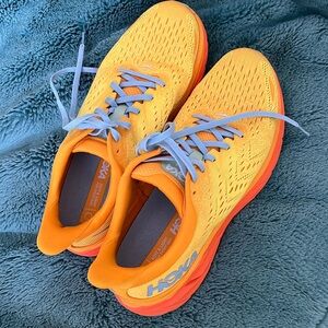 Very gently used size 10 men’s Hoka, walking shoes, yellow.